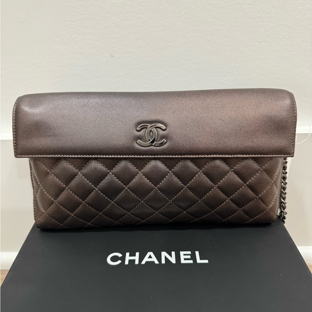 Chanel wallet on a chain.